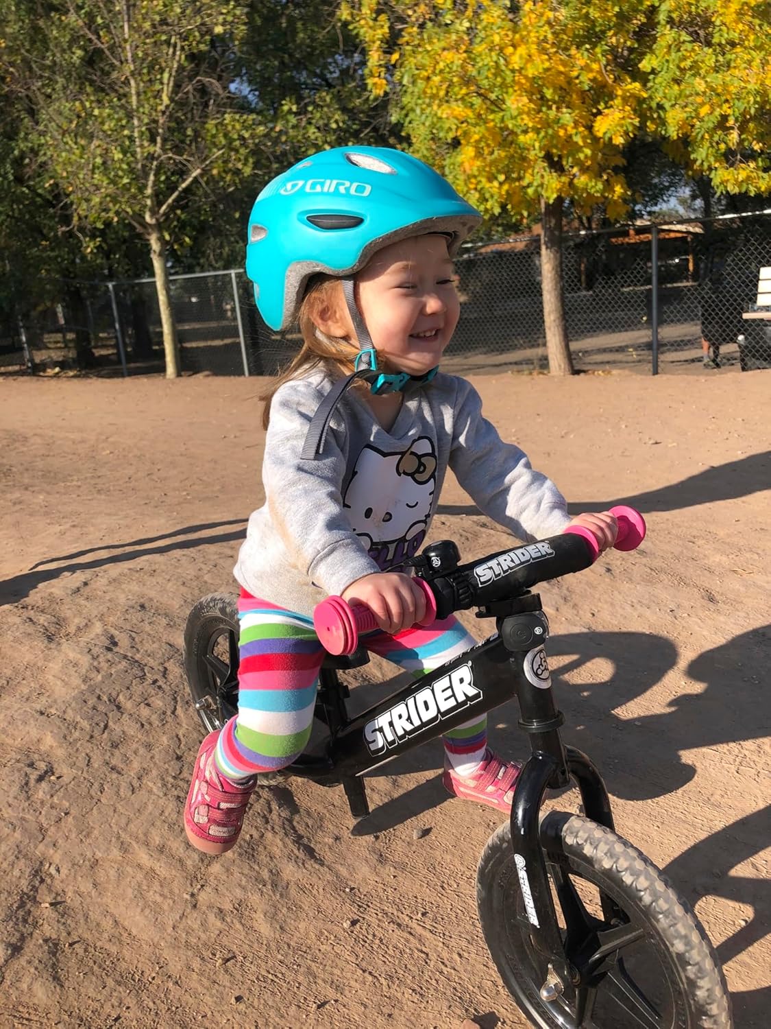 Strider 12” Sport Bike - No Pedal Balance Bicycle for Kids 1 to 4 Years - Includes Safety Pad, Padded Seat, Mini Grips & Flat-Free Tires - Tool-Free Assembly & Adjustments